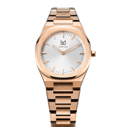 Makydo's rose gold white dial women's watch is finely colored, eye-catching allure captivates effortlessly, making it the perfect companion for both special occasions and everyday elegance. The brilliant, highly transparent sapphire crystal with anti-reflective coating expose the sophisticated silver baton hands with BGW9 Lume. The flawless symmetry of perfected Rose Gold plated 316L stainless steel integrated bracelet complimented with a 6.7mm of slim case powered by a sturdy Miyota quartz movement.