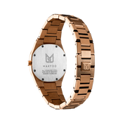 Makydo's rose gold white dial women's watch is finely colored, eye-catching allure captivates effortlessly, making it the perfect companion for both special occasions and everyday elegance. The brilliant, highly transparent sapphire crystal with anti-reflective coating expose the sophisticated silver baton hands with BGW9 Lume. The flawless symmetry of perfected Rose Gold plated 316L stainless steel integrated bracelet complimented with a 6.7mm of slim case powered by a sturdy Miyota quartz movement.