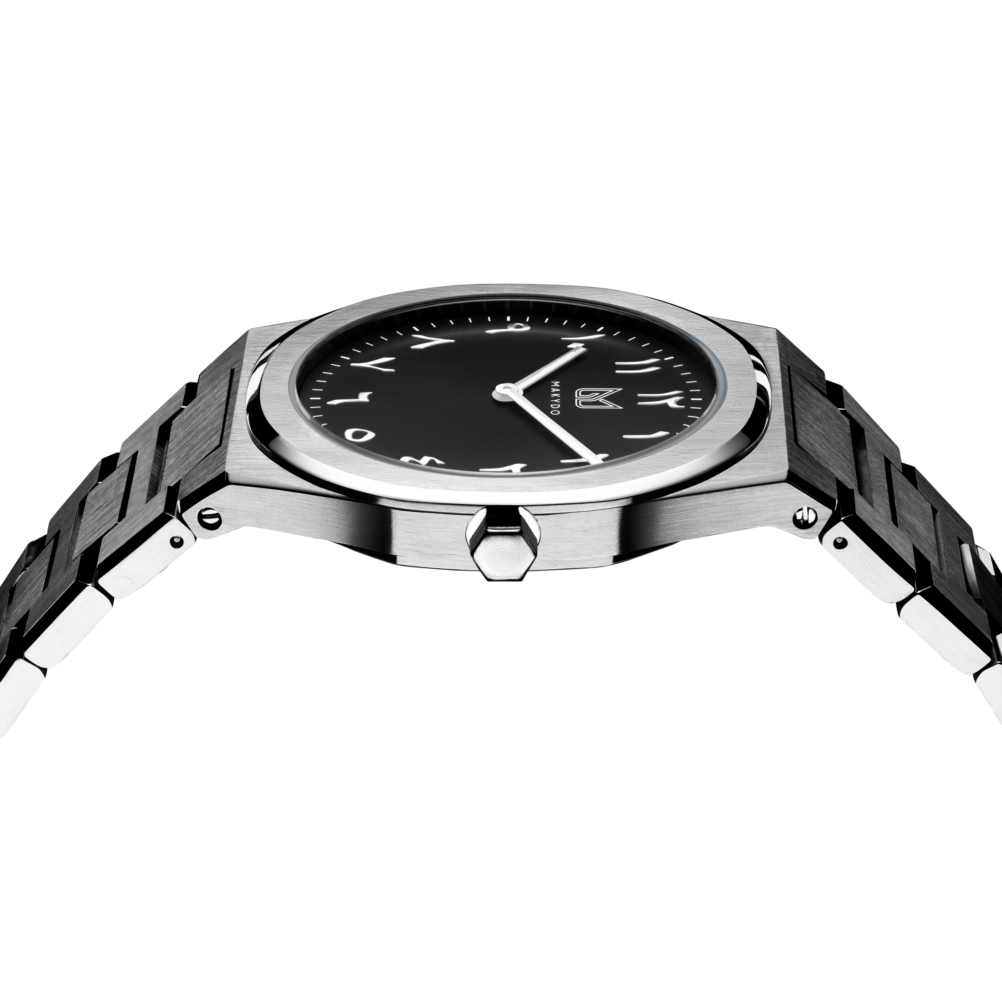 Makydo onyx black  middle east men's watch reflects the depths with embellished with exotic Middle East inspired numerals, it exudes irresistible allure. The brilliant, highly transparent sapphire crystal with anti-reflective coating expose the sophisticated silver baton hands with BGW9 Lume. The flawless symmetry of the 316L Stainless Steel integrated bracelet complimented with a 6.7mm of slim case powered by a sturdy Miyota quartz movement.