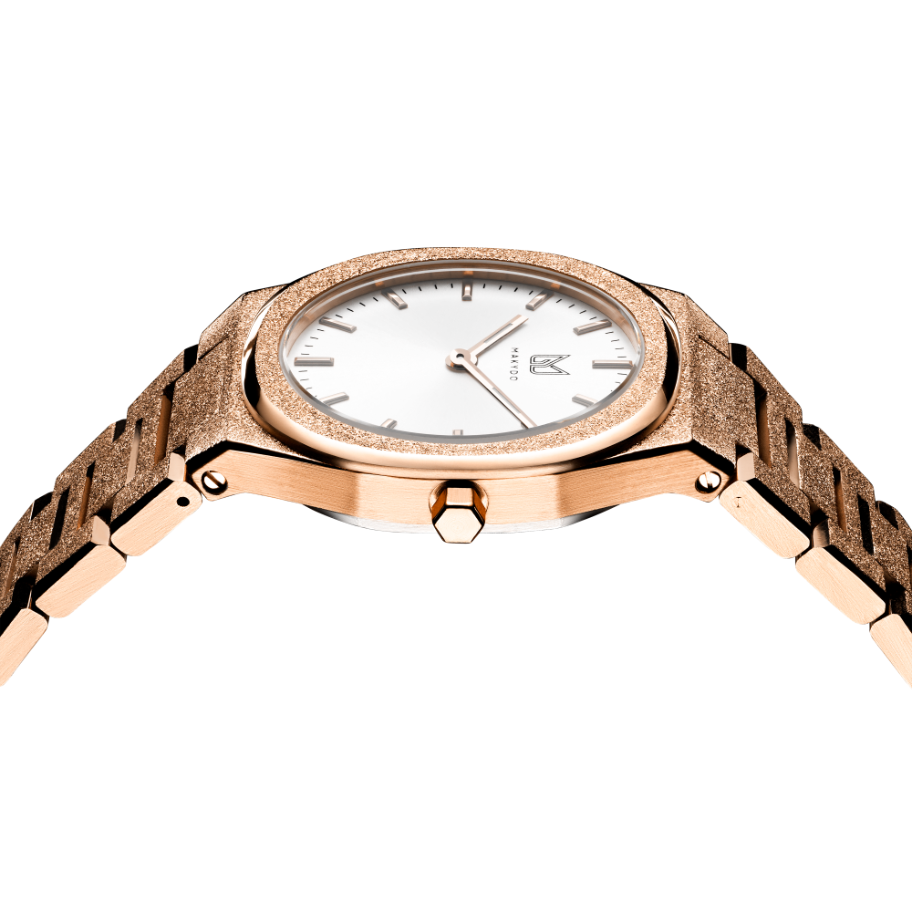 Behold the ethereal masterpiece that graces the wrist—the rose gold-plated frosted finish pearl white women's watch.  Each passing second inspires self-discovery, radiating resilience and passion.  The brilliant, highly transparent sapphire crystal with anti-reflective coating expose the sophisticated silver baton hands with BGW9 Lume. The flawless symmetry of the 316L Stainless Steel integrated bracelet complimented with a 6.7mm of slim case powered by a sturdy Miyota quartz movement.
