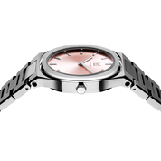 Unveil your captivating beauty with this Makydo women's watch, where strength and grace intertwine in perfect balance. The light pink dial, like a soft blush of dawn, emanates a tender radiance and kindling passions. The brilliant, highly transparent sapphire crystal with anti-reflective coating expose the sophisticated silver baton hands with BGW9 Lume. The flawless symmetry of the 316L Stainless Steel integrated bracelet complimented with a 6.7mm of slim case powered by a sturdy Miyota quartz movement.