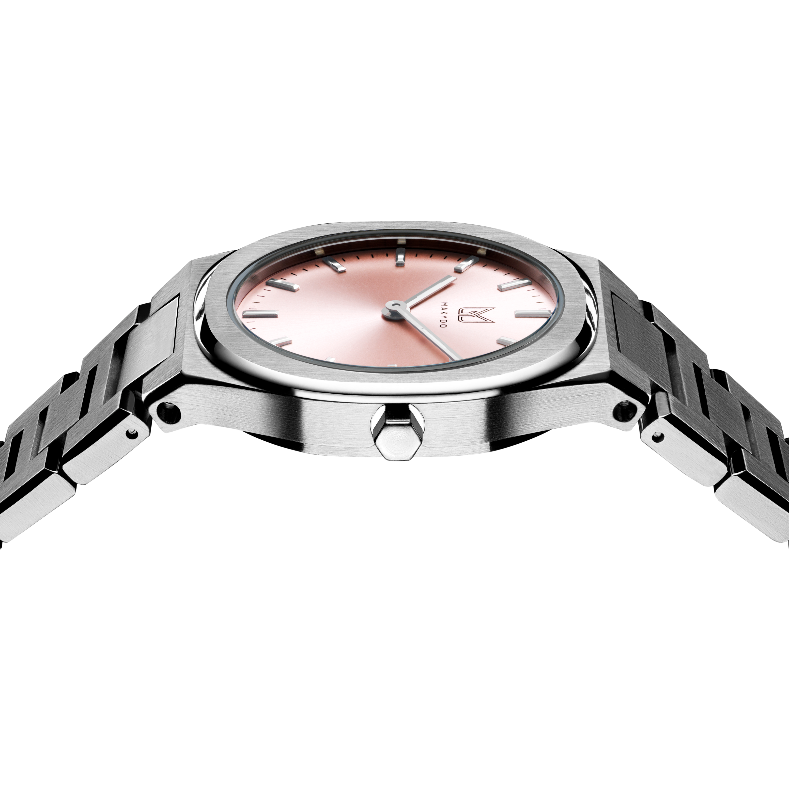 Unveil your captivating beauty with this Makydo women's watch, where strength and grace intertwine in perfect balance. The light pink dial, like a soft blush of dawn, emanates a tender radiance and kindling passions. The brilliant, highly transparent sapphire crystal with anti-reflective coating expose the sophisticated silver baton hands with BGW9 Lume. The flawless symmetry of the 316L Stainless Steel integrated bracelet complimented with a 6.7mm of slim case powered by a sturdy Miyota quartz movement.