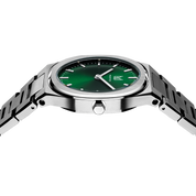 The captivating essence of this Makydo women's watch, adorned with an emerald green dial that sparkles like a hidden gem. It is a testament to your vibrant spirit and unwavering strength.The brilliant, highly transparent sapphire crystal with anti-reflective coating expose the sophisticated silver baton hands with BGW9 Lume. The flawless symmetry of the 316L Stainless Steel integrated bracelet complimented with a 6.7mm of slim case powered by a sturdy Miyota quartz movement.