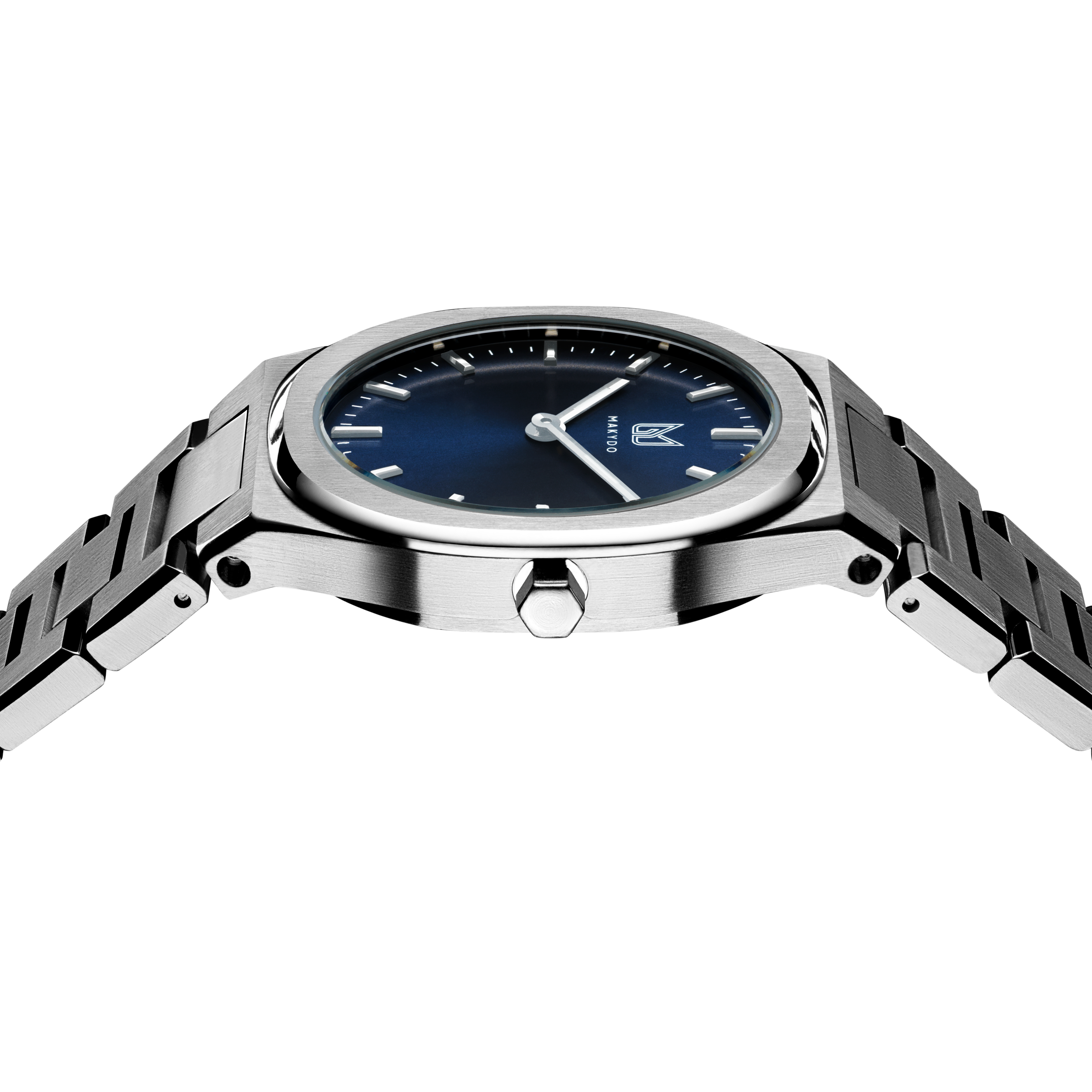The timeless allure of this Makydo  women's watch, where sophistication meets the depths of inspiration. The classy blue dial, like an ocean of possibilities, evokes a sense of tranquility and limitless potential.  The brilliant, highly transparent sapphire crystal with anti-reflective coating expose the sophisticated silver baton hands with BGW9 Lume. The flawless symmetry of the 316L Stainless Steel integrated bracelet complimented with a 6.7mm of slim case powered by a sturdy Miyota quartz movement.