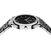Makydo's onyx black women's watch dial becomes a portal to endless possibilities, a reminder that even in the depths of darkness, brilliance can emerge. The brilliant, highly transparent sapphire crystal with anti-reflective coating expose the sophisticated silver baton hands with BGW9 Lume. The flawless symmetry of the 316L Stainless Steel integrated bracelet complimented with a 6.7mm of slim case powered by a sturdy Miyota quartz movement.