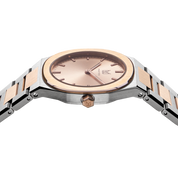 As steel and rose gold unite, Makydo's women's watch with a pink gold dial, like a sunrise of possibilities, ignites your spirit with a resplendent glow.. The  The brilliant, highly transparent sapphire crystal with anti-reflective coating expose the sophisticated silver baton hands with BGW9 Lume. The flawless symmetry of perfected Rose Gold plated 316L stainless steel integrated bracelet complimented with a 6.7mm of slim case powered by a sturdy Miyota quartz movement.