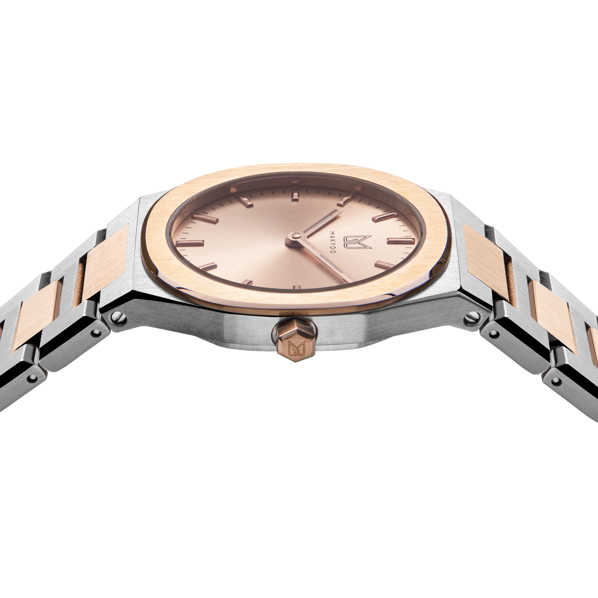 As steel and rose gold unite, Makydo's women's watch with a pink gold dial, like a sunrise of possibilities, ignites your spirit with a resplendent glow.. The  The brilliant, highly transparent sapphire crystal with anti-reflective coating expose the sophisticated silver baton hands with BGW9 Lume. The flawless symmetry of perfected Rose Gold plated 316L stainless steel integrated bracelet complimented with a 6.7mm of slim case powered by a sturdy Miyota quartz movement.