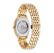 Gold watch with a visible brand name on a white background