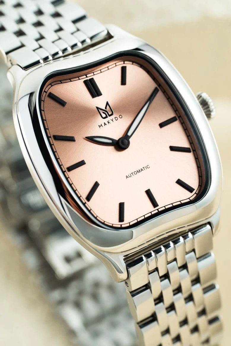 A watch that sits flat against the wrist the way a dress watch should