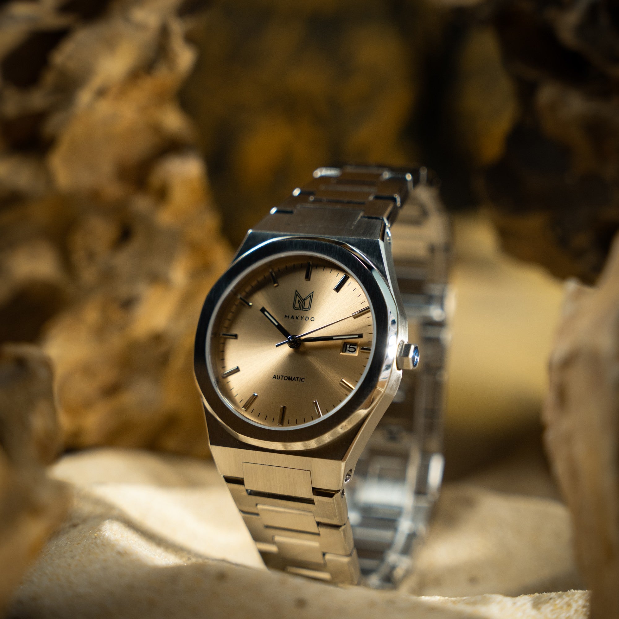 MAKYDO Champagne 38 automatic unisex watch, featuring a Champagne colour dial.  316L Stainless Steel integrated bracelet complimented with a 9mm of slim case powered by a sturdy Japan MIYOTA 9015 movement.