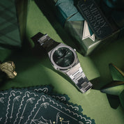 MAKYDO Emerald Green Mosaic 38 automatic unisex watch, featuring green mosaic pattern dial.  316L Stainless Steel integrated bracelet complimented with a 9mm of slim case powered by a sturdy Japan MIYOTA 9015 movement.