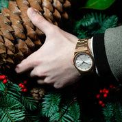 Wrist shot of man wearing MAKYDO Rose Gold white Mosaic 38 automatic unisex watch, featuring green mosaic pattern dial.  316L Stainless Steel integrated bracelet complimented with a 9mm of slim case powered by a sturdy Japan MIYOTA 9015 movement.