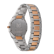 As steel and rose gold unite, Makydo's women's watch with a pink gold dial, like a sunrise of possibilities, ignites your spirit with a resplendent glow.. The  The brilliant, highly transparent sapphire crystal with anti-reflective coating expose the sophisticated silver baton hands with BGW9 Lume. The flawless symmetry of perfected Rose Gold plated 316L stainless steel integrated bracelet complimented with a 6.7mm of slim case powered by a sturdy Miyota quartz movement.